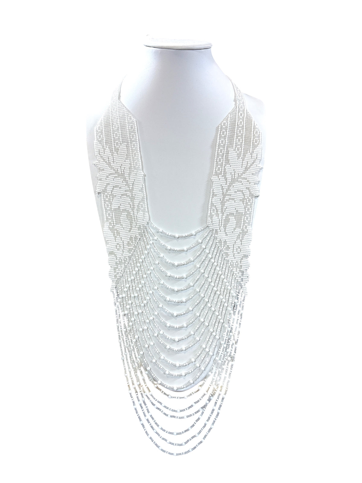 All-white beaded lace leaves necklace with woven panels and layered draping strands on a display bust