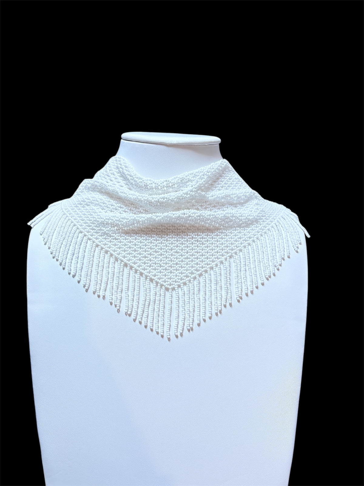 All-white beaded scarf necklace hand-woven from glass seed beads, draped kerchief-style with long fringe