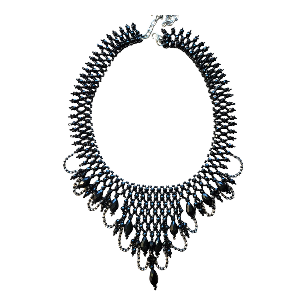 Victorian style choker hand-netted from black seed beads and faceted crystal drops, on white background