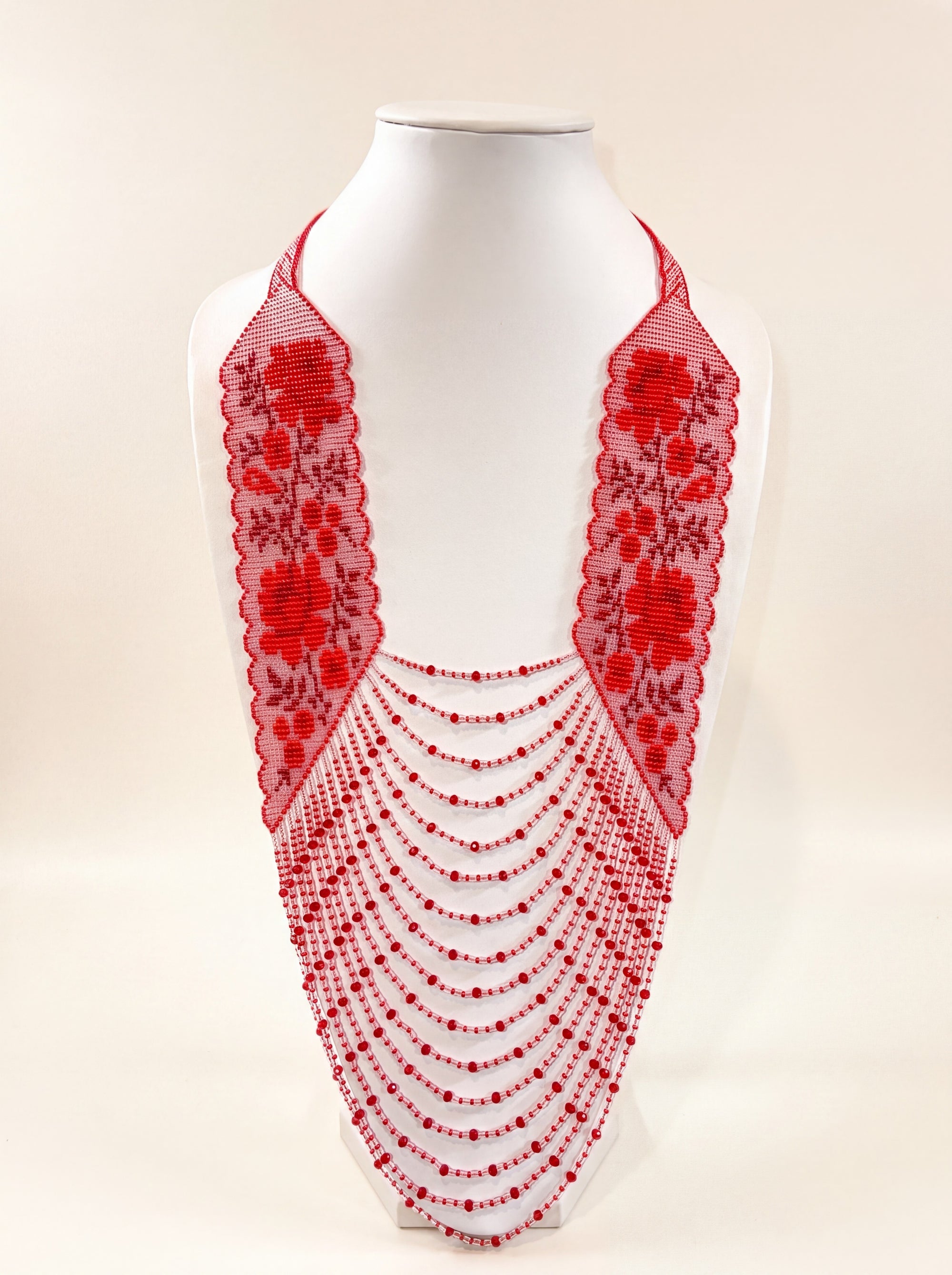 Handmade beaded necklace in Ukrainian folk style with red rose lace panels and draped scarlet bead strands