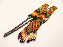 Handmade beaded gerdan necklace in Ukrainian folk style with star medallions in orange, green, red and black