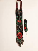 Handmade loomed gerdan necklace with red poppy motif on black glass seed beads, with matching bracelet