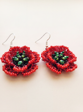 Flower earrings with red beaded poppy blooms, handmade with glass seed beads and green accents