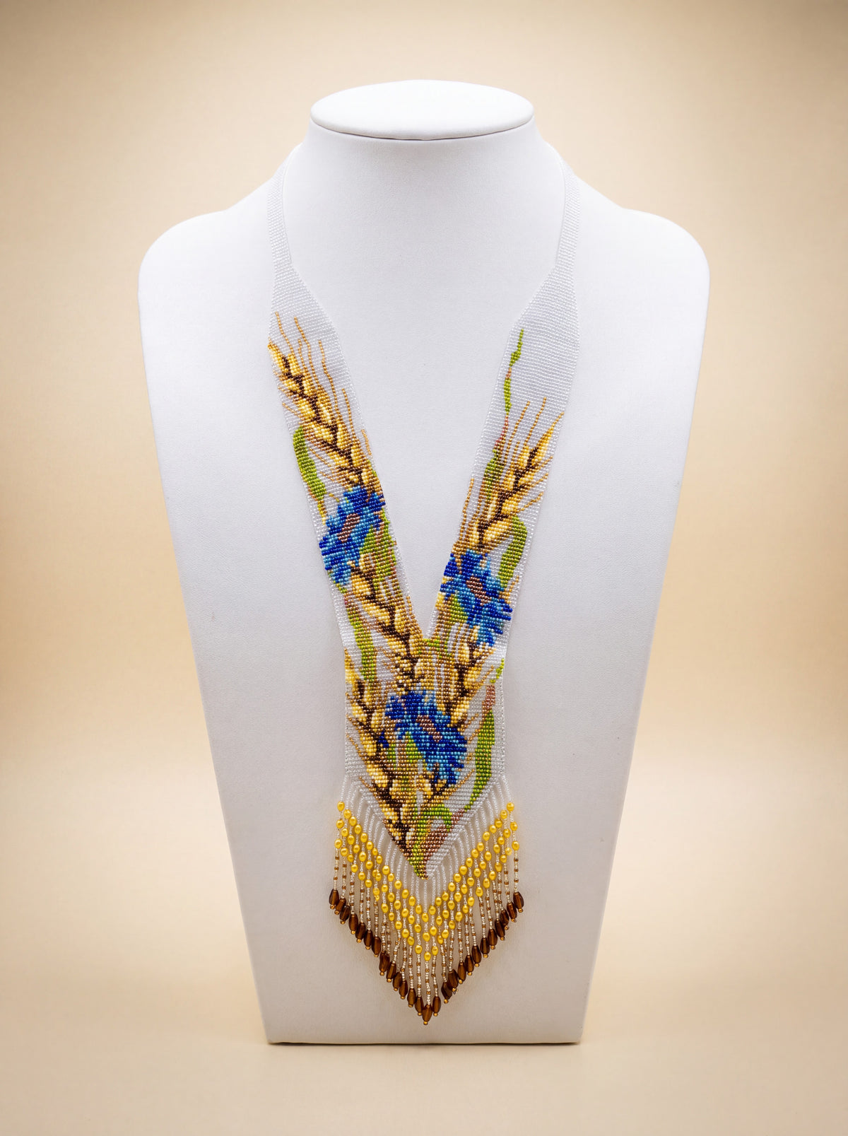 Handmade beaded "Wheat and cornflowers" gerdan necklace with golden wheat stalks, blue flowers, and fringe