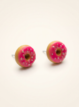 Small donut stud earrings handmade from polymer clay with pink glaze and silver sprinkles