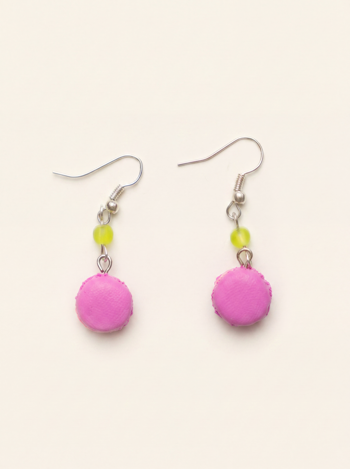 Macaron earrings handmade from polymer clay, pink macarons with green glass beads on silver hooks