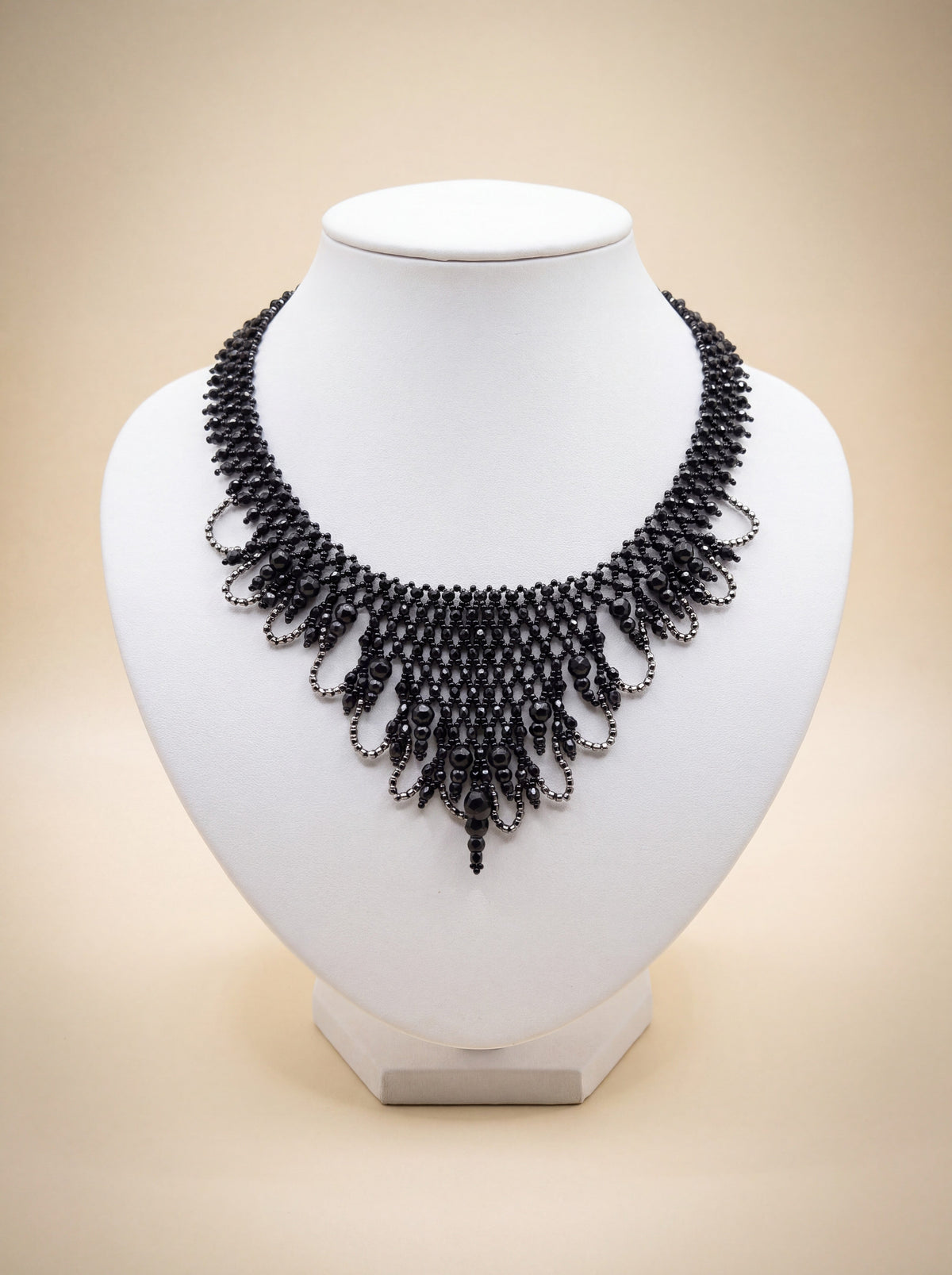 Black beaded Victorian lace choker on a white bust - the Gothic chapter