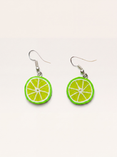 Lime slice earrings handmade from polymer clay, green citrus rounds on silver hooks