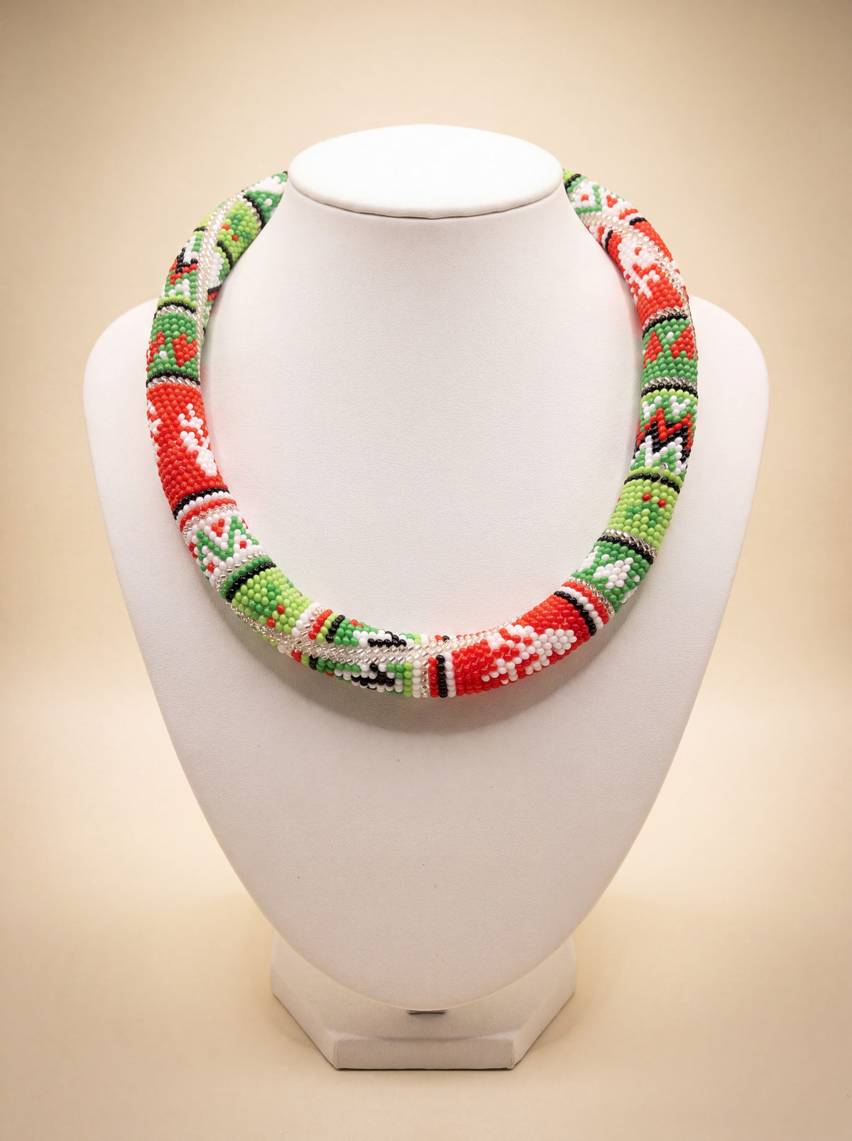 Handmade beaded "Christmas ornaments" necklace with red, green, and white bead-crochet pattern