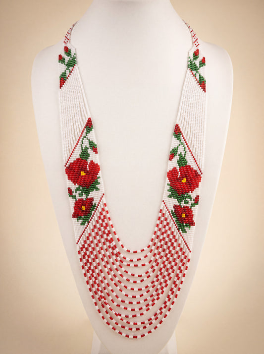 Handmade necklace "Poppies," loomed glass seed beads, red poppy motif on white with fringe strands.