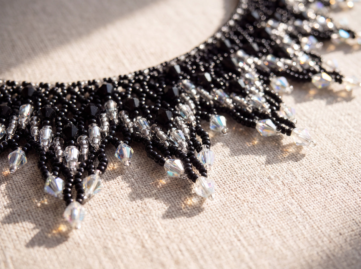 Macro detail of silver-grey beaded rays tipped with clear iridescent crystals