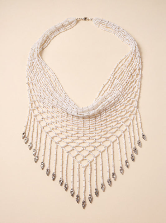 Handmade white and silver beaded scarf necklace, woven collar with dangling fringe strands.