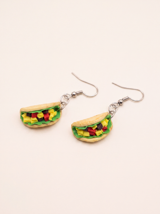 Taco earrings handmade from polymer clay with lettuce, cheese and tomato filling on silver hooks