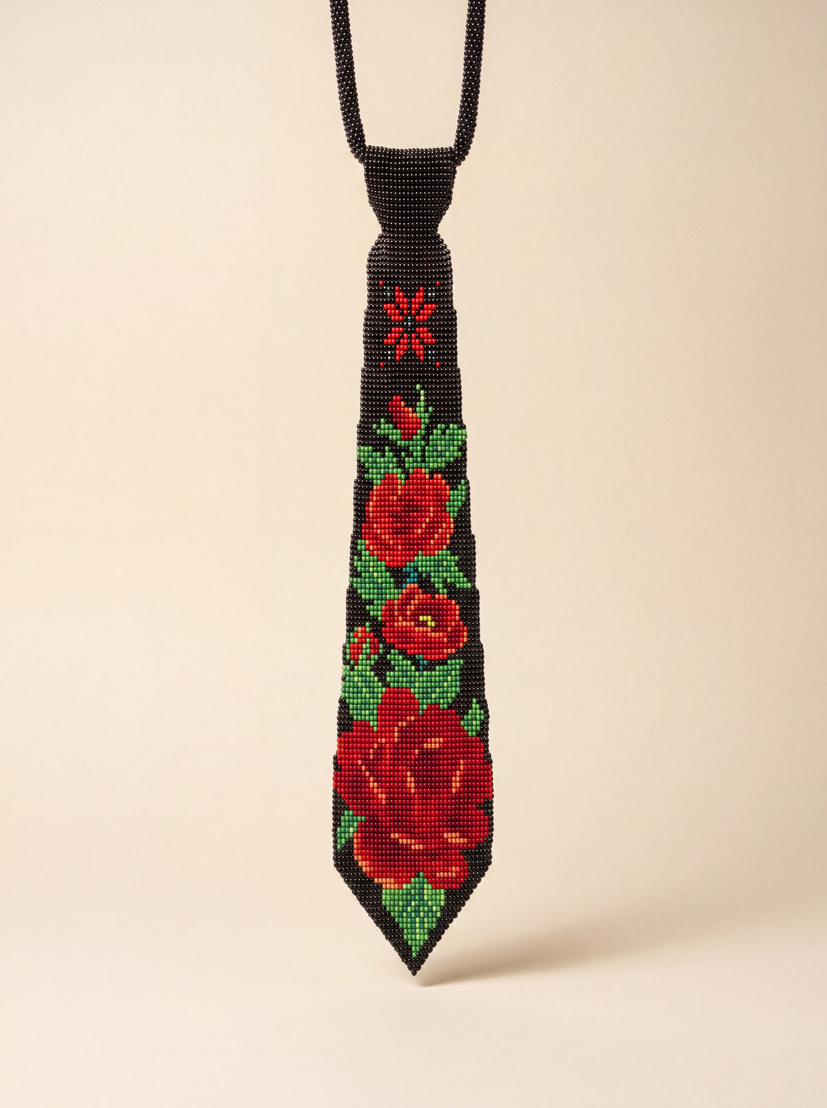 Handmade black beaded tie-necklace, "Roses" design, with red beaded roses and green leaves, glass seed beads.