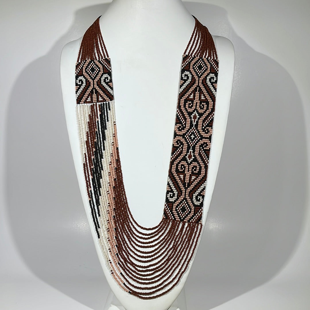 Necklace "Bogdana" front view showing loomed scroll pattern panels and cascading brown bead strands