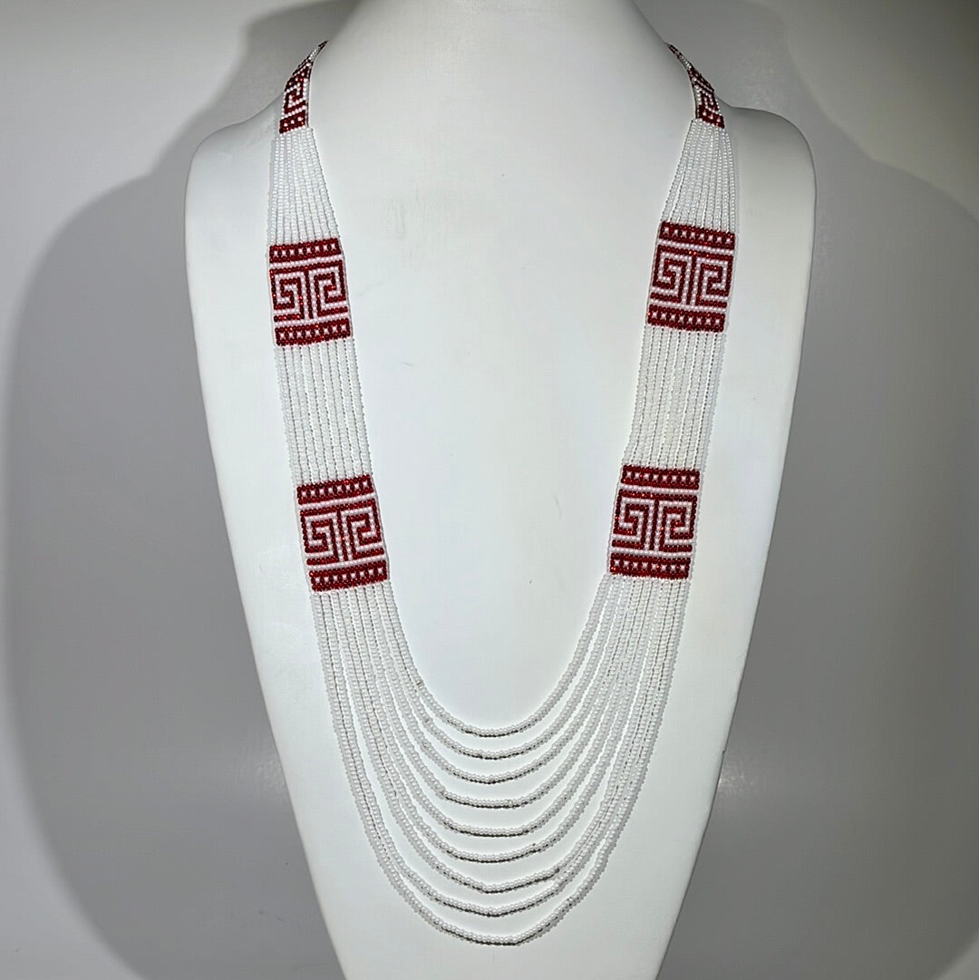 White multi-strand beaded Greece necklace with red Greek key meander pattern and draping strands