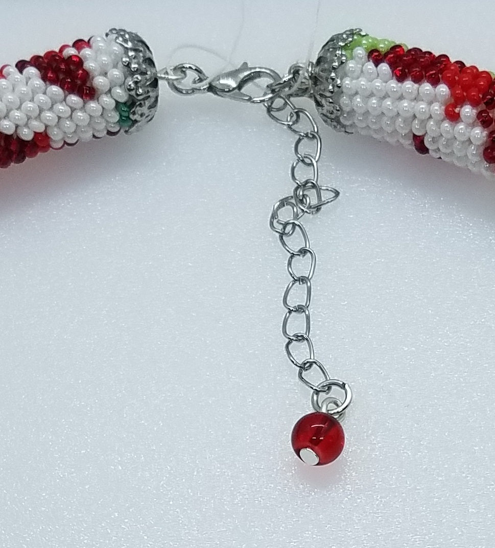 Lobster clasp and extender chain with red bead drop on the glass seed bead Christmas ornaments necklace