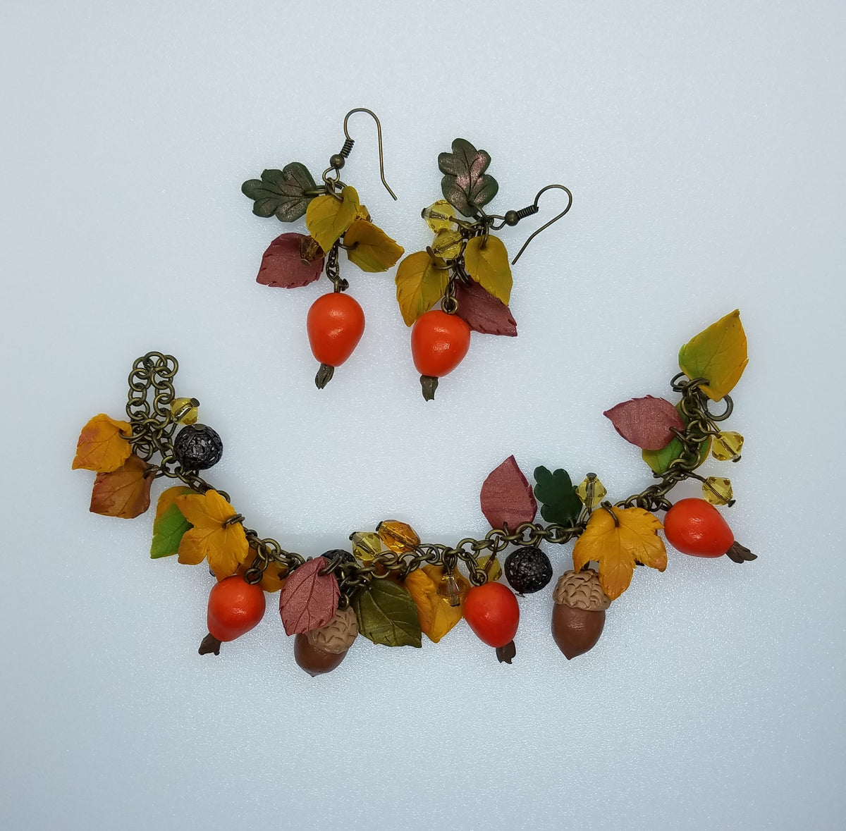 Polymer clay dog-rose and acorn bracelet with matching autumn leaf dangle earrings